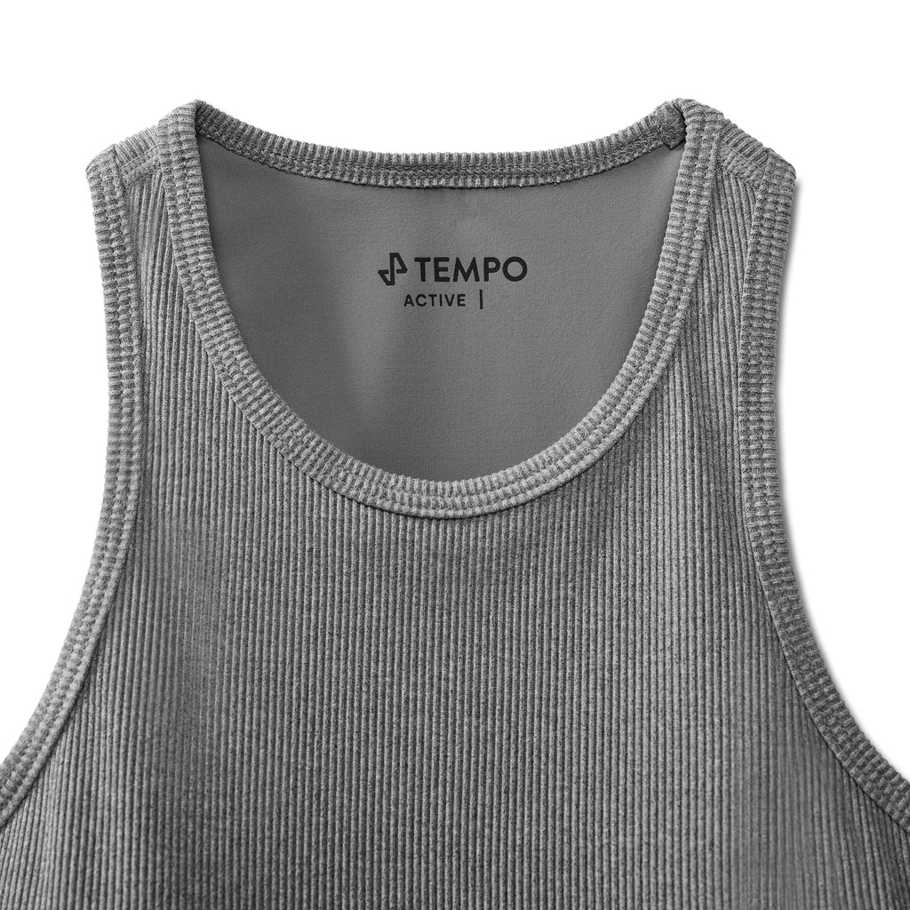 closeup of upper front of grey Breakthrough tank showing neck label with Tempo Logo and active text
