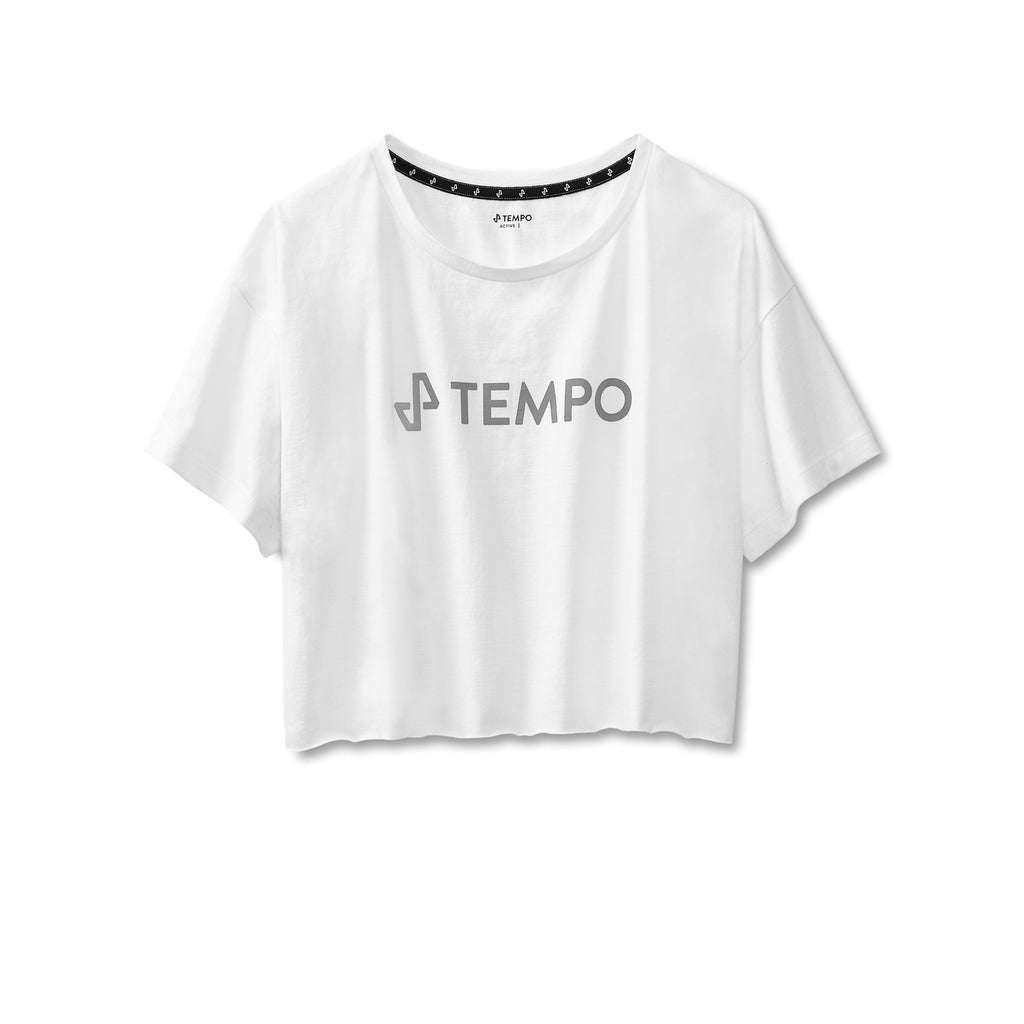 front view of white Stride Crop Tee with grey tempo logo and TEMPO text on center chest