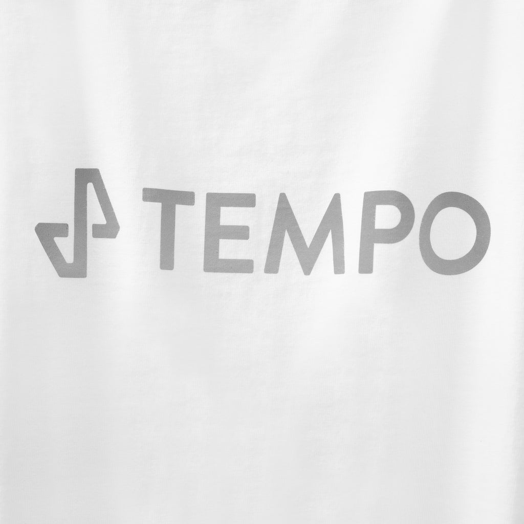 closeup of center chest of white Stride Crop Tee showing grey TEMPO logo